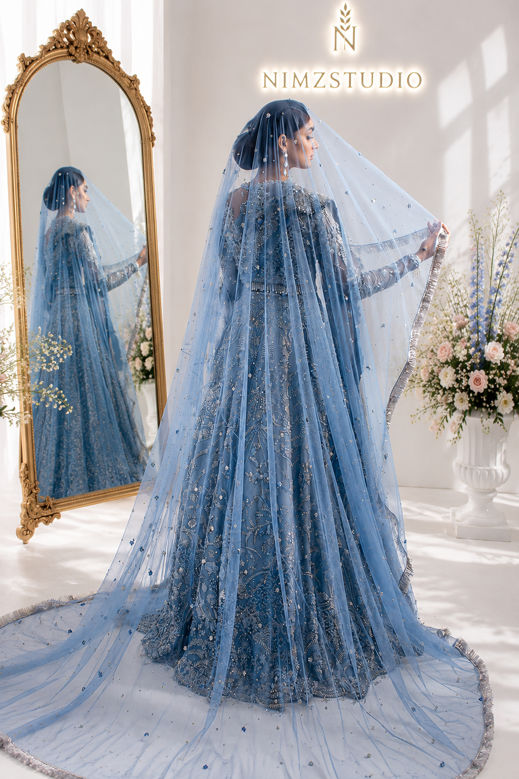 detail of NYRA AARZU bridal veil with handcrafted embellishments and luxury Pakistani designer inspired wedding couture photographed in NimzStudio.