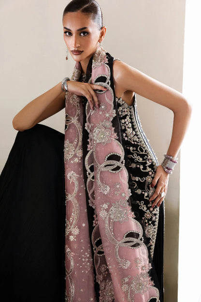 Pakistani formal wear in black organza with pink dupatta pearl and jewel embellishments