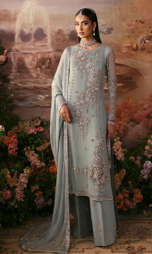 Detailed view of silver embellishment and embroidered chiffon fabric on a Nomi Ansari inspired Pakistani designer suit, ideal for wedding and formal wear.