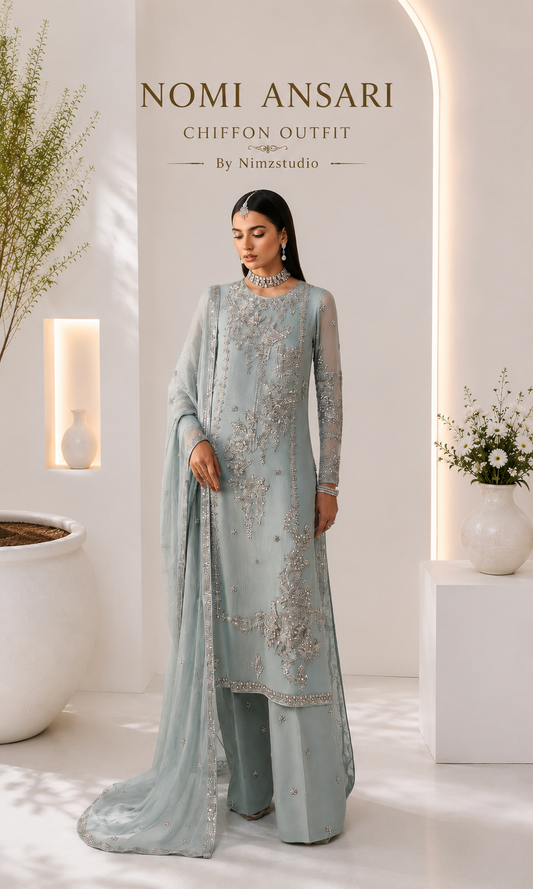 Luxury Nomi Ansari inspired ice blue chiffon shirt close-up featuring intricate silver hand embroidery, sequins and embellishments. Pakistani designer inspired party wear by Nimzcollection.
