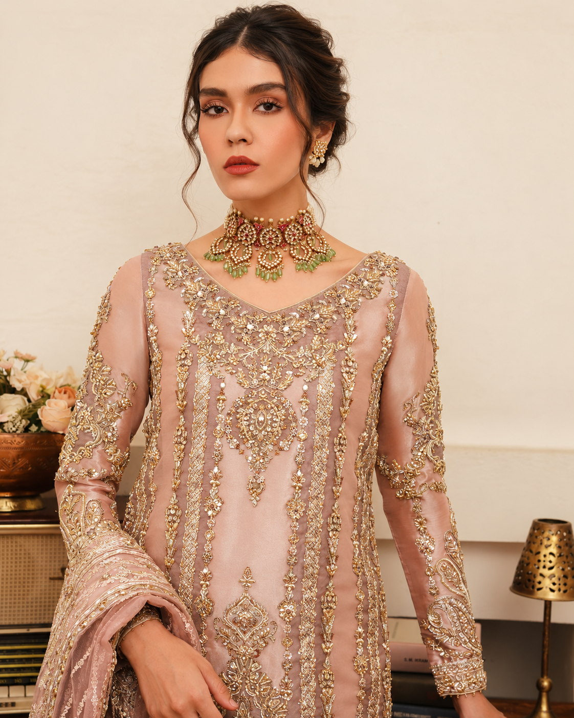 Close-up of Asture Faiza Saqlain luxury organza dress with intricate gold Kora Dabka embroidery and handcrafted embellishments