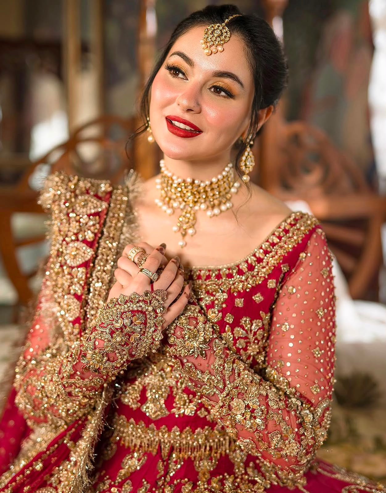 Faiza Saqlain Arusa 14 panel bridal red raw silk maxi with elegant flare and handmade four side embellished dupatta.
