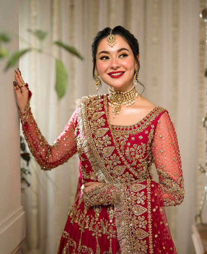 Front view of Faiza Saqlain Arusa luxury bridal red raw silk maxi featuring handcrafted crystal, pearl and kora dabka embroidery.