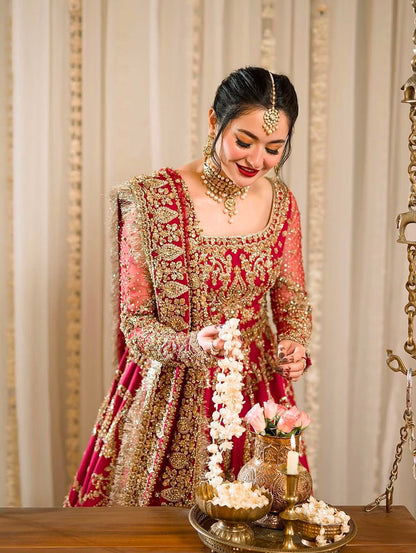 Close-up of Faiza Saqlain Arusa bridal maxi showcasing intricate neckline, crystal pearls and handmade embroidery.