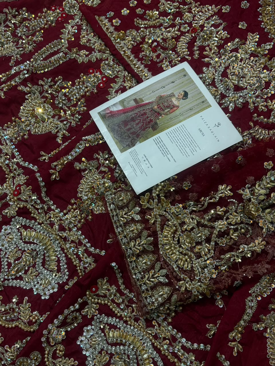 Premium raw silk bridal fabric with handcrafted embellishments on Faiza Saqlain Arusa luxury wedding dress.