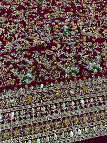 Luxury Haris Shakeel sharara border detail with handcrafted embroidery, mirror work and premium embellishments on a maroon Pakistani designer inspired bridal and party wear outfit.