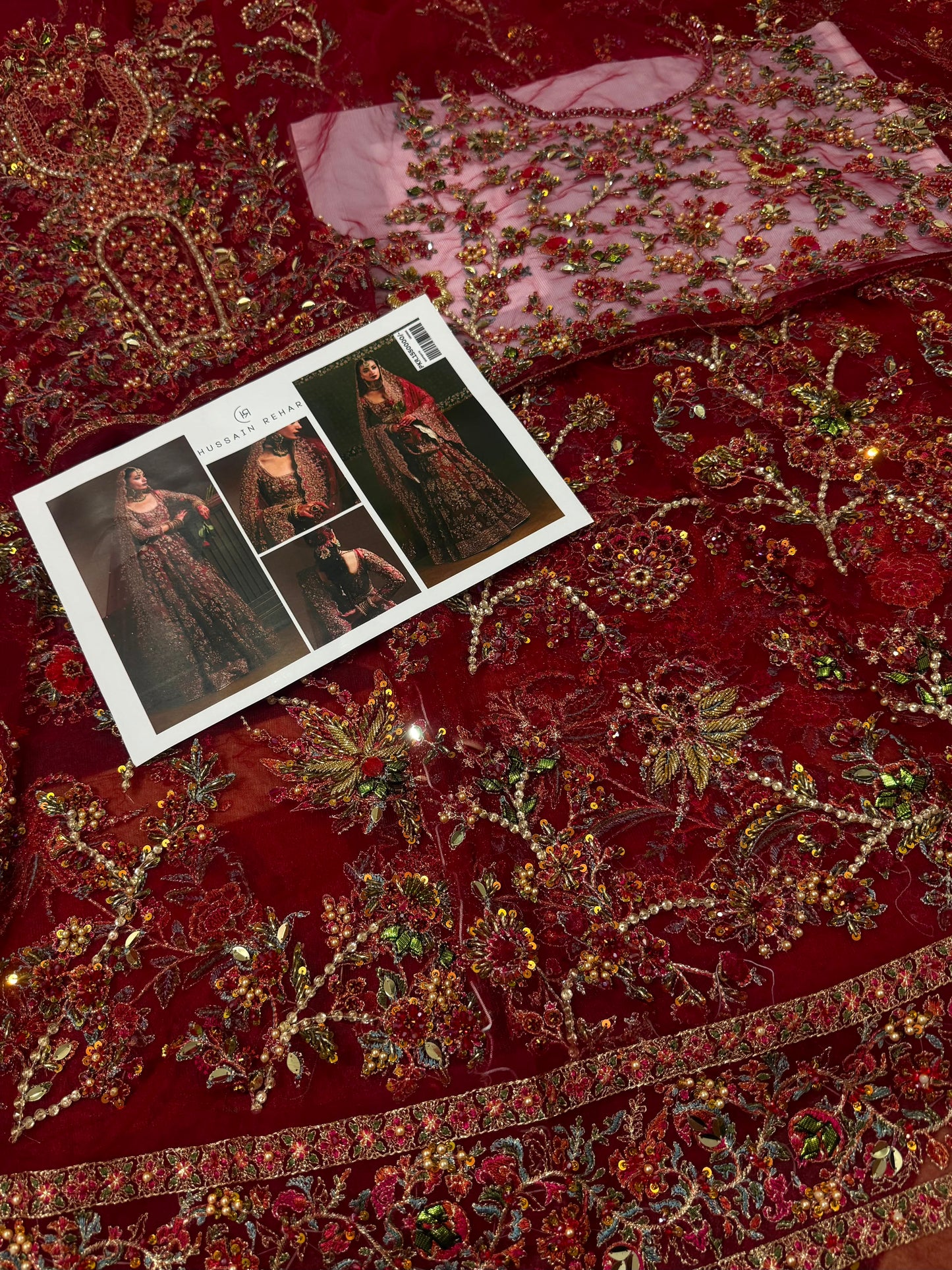 Luxury bridal dupatta close-up with heavily embellished border, intricate zari embroidery, handcrafted detailing, and elegant Pakistani bridal fashion.