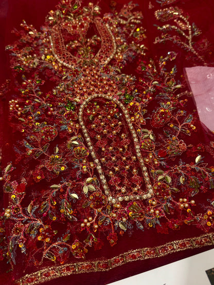 Close-up of bridal neckline and bodice featuring premium hand embellishments, crystal detailing, intricate zari embroidery, and luxury Pakistani designer inspired craftsmanship.