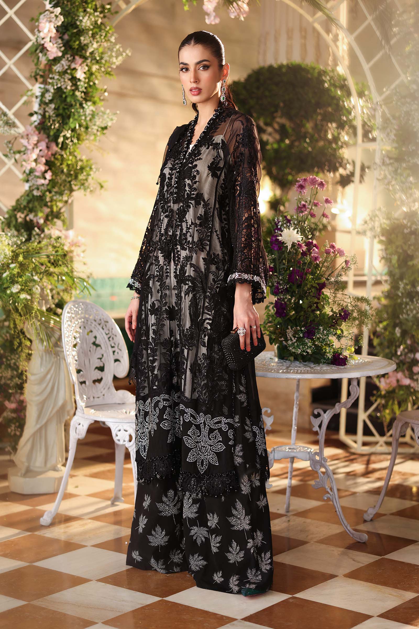 full length chiffon outfit of Maria B black Pakistani dress featuring intricate chiffon embroidery and embellishment