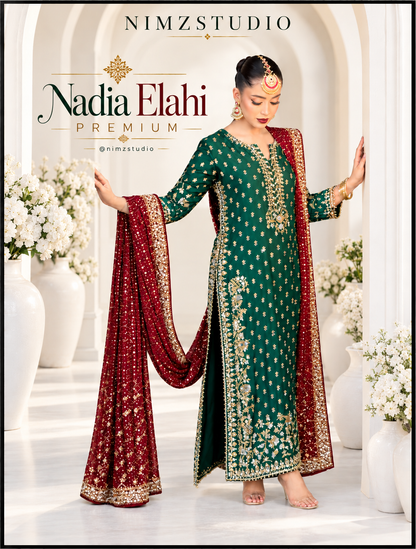 Nadia Elahi premium emerald green embroidered Pakistani wedding dress with maroon embellished dupatta, full outfit view