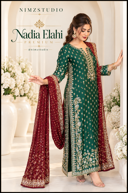 Close-up of Nadia Elahi emerald green formal shirt showing intricate gold-toned neckline embroidery and decorative motifs